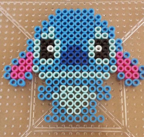 Put the pegboard on an ironing board or a wood cutting board. . Perler bead patterns stitch